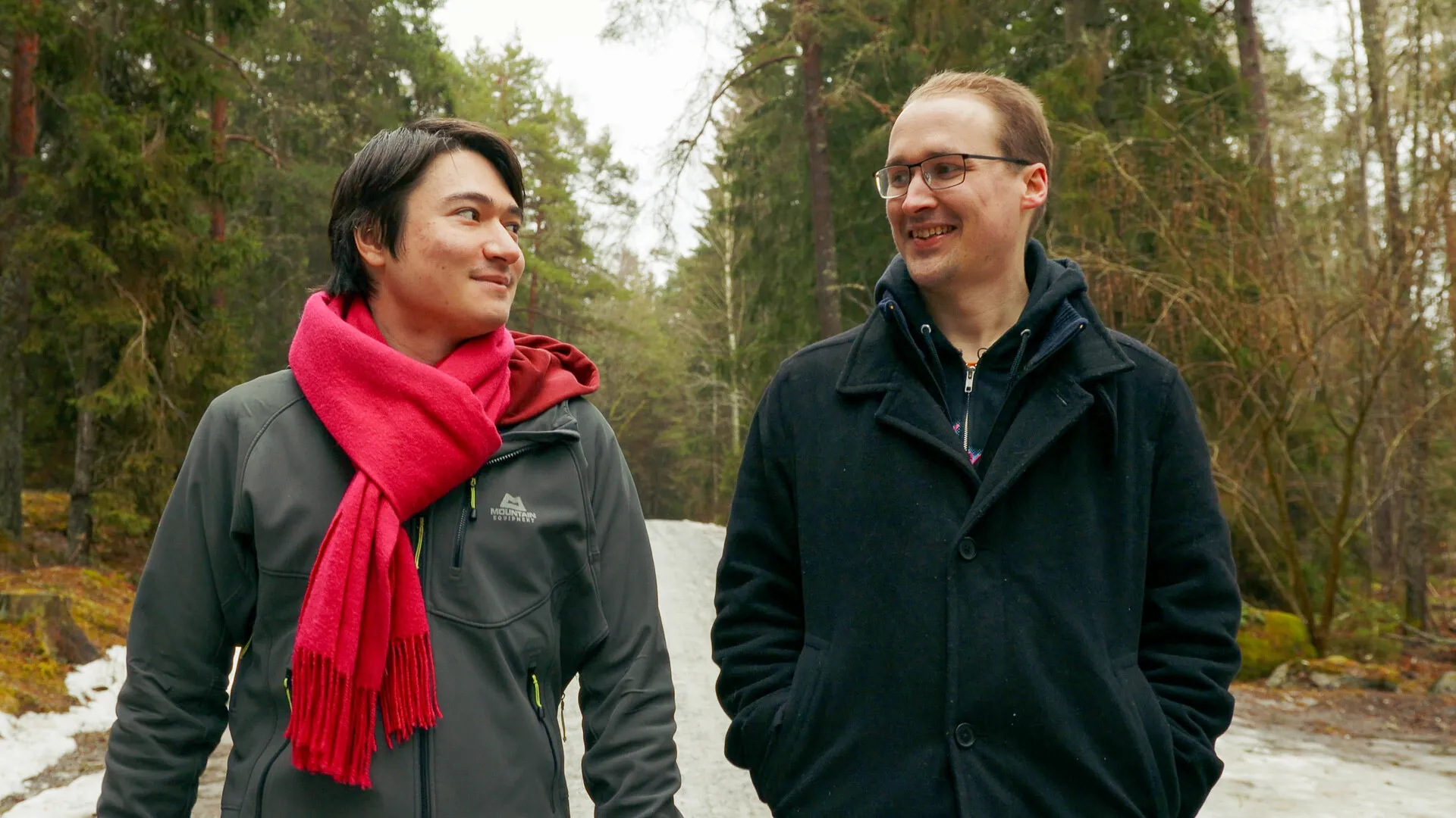 Hiyu and Photographotter walking through the woods of Sweden in The Reality Of Hope